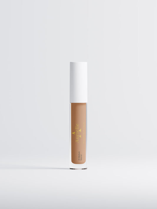 Skincare serum bottle with beige label on a white background
